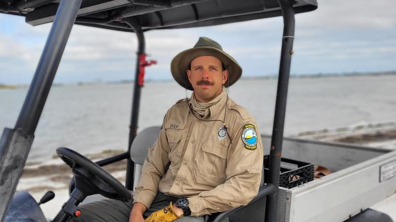 Ranger Michael Dyer on the beach at Caladesi Island State Park.