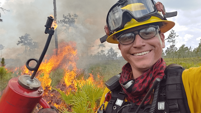 Christopher Carmago with prescribed fire equipment. 