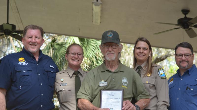 Volunteer receiving award.