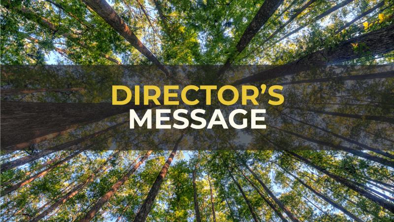 Title reads "Director's Message" with trees in the background. 