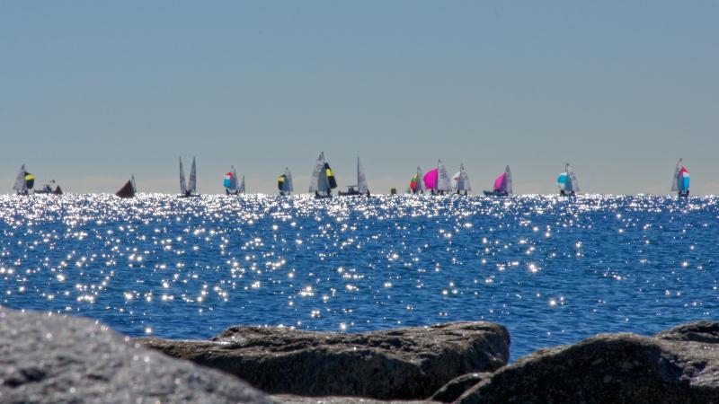 A view of a line of boats in the distance.