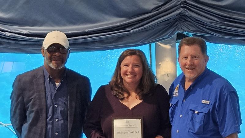 Volunteer receiving award.