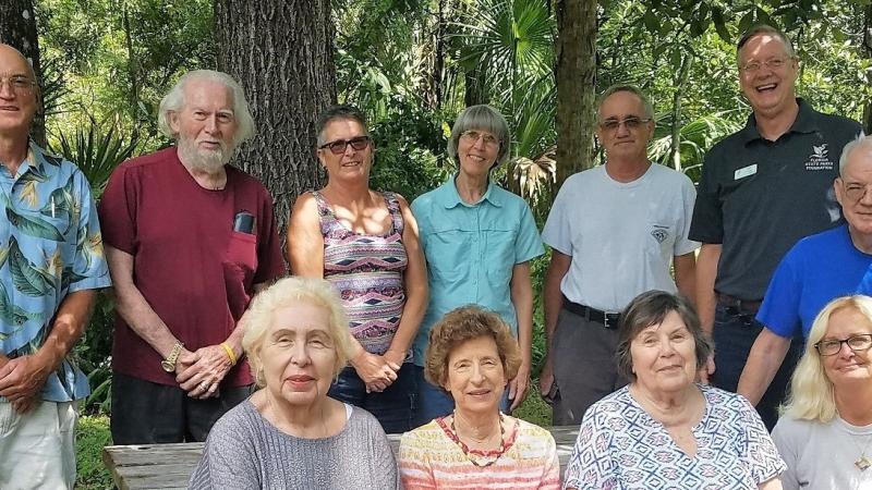 The Board of Directors smiling at the camera.