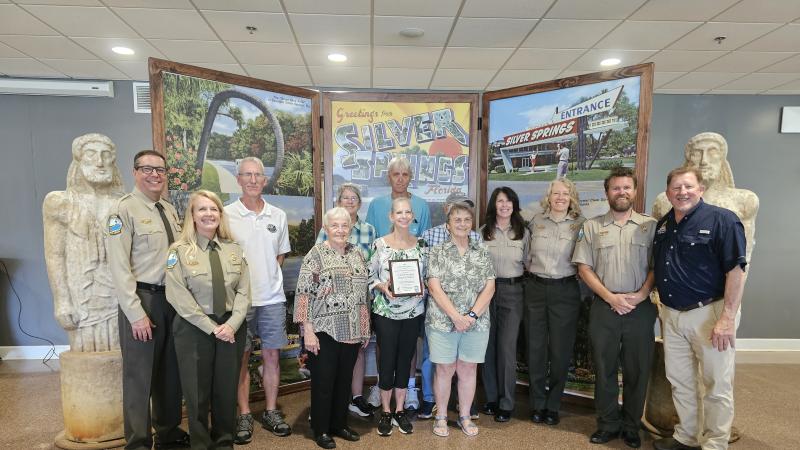Volunteer receiving award.