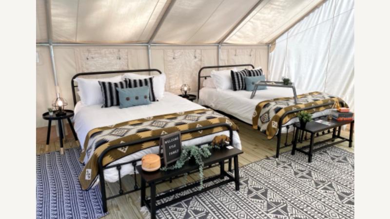 Two beds inside the glamping tent at Hillsborough River State Park.