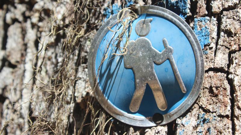 A trail marker on a hiking trail.