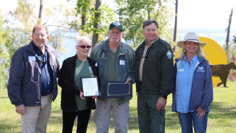 Cotton and Patti receive their award.