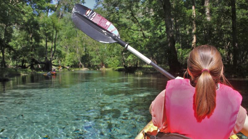 Visitor kayaks the spring run