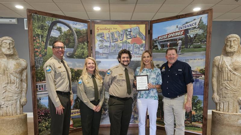 Volunteer receiving award.