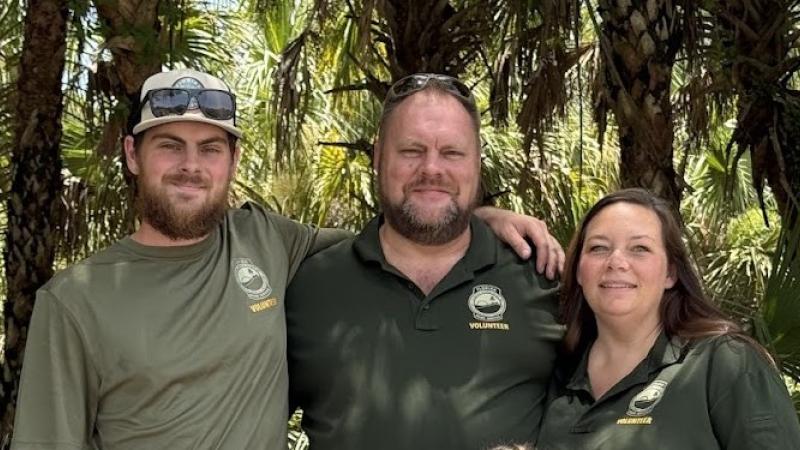 Jeff Mosher with his wife and son.