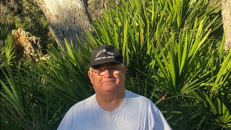 Jim Murphy standing in front of trees at Faver-Dykes State Park 