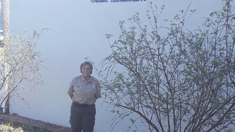 Park Ranger Joanna Lindsey stands proudly in front of the Constitution Convention Museum. 