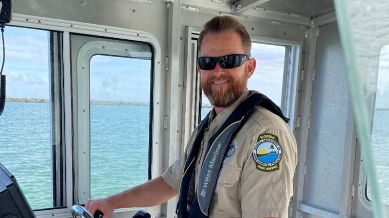 Josh Slaughter on a boat.