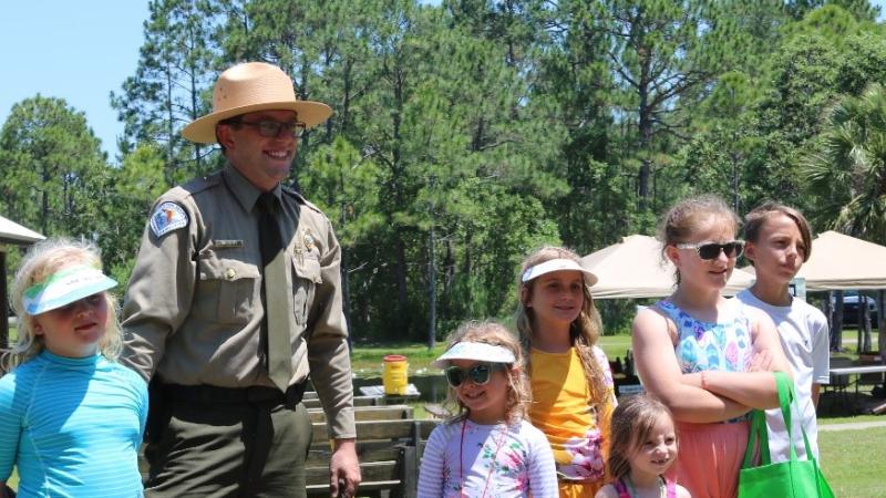 A group of Junior Rangers in Topsail Hill Preserve State Park.