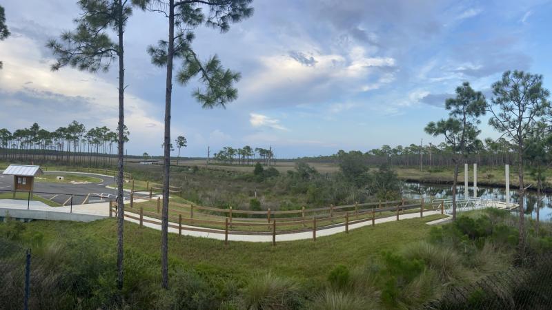 A side connects the parking area with kayak launch.