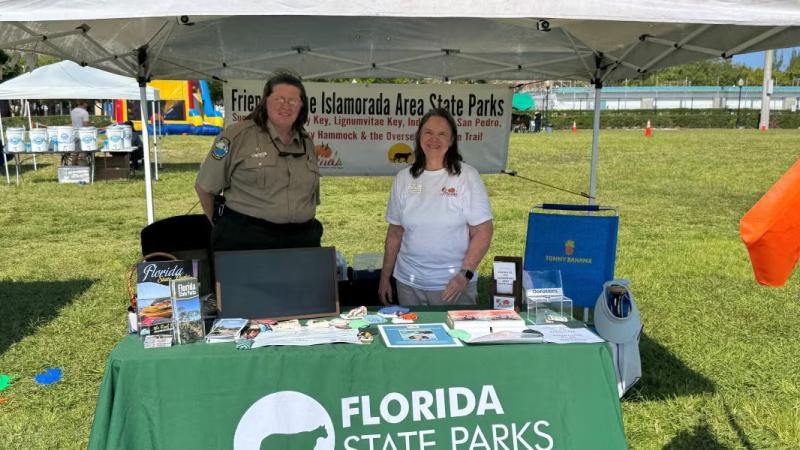 Karen Sunderland at a booth.