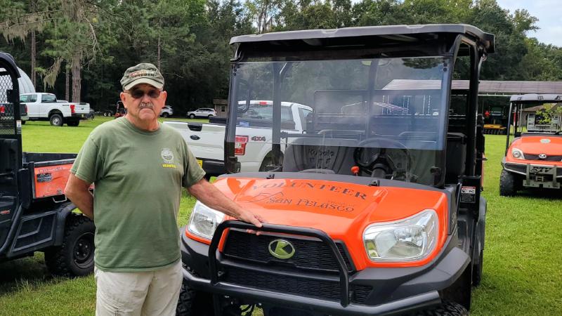 A photo of Mike Kelley and an ATV 