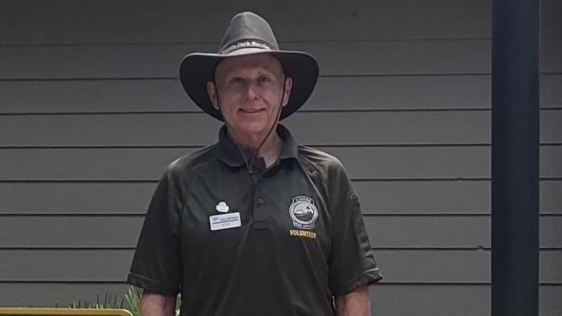 Ken McKinney standing.