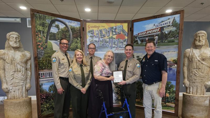 Volunteer receiving award.