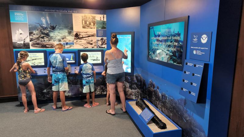 Park visitors enjoy the new exhibit.