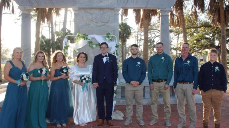 A photo of a wedding party at Constitution Convention Museum State Park 