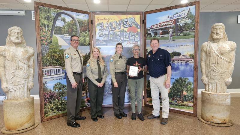 Volunteer receiving award.
