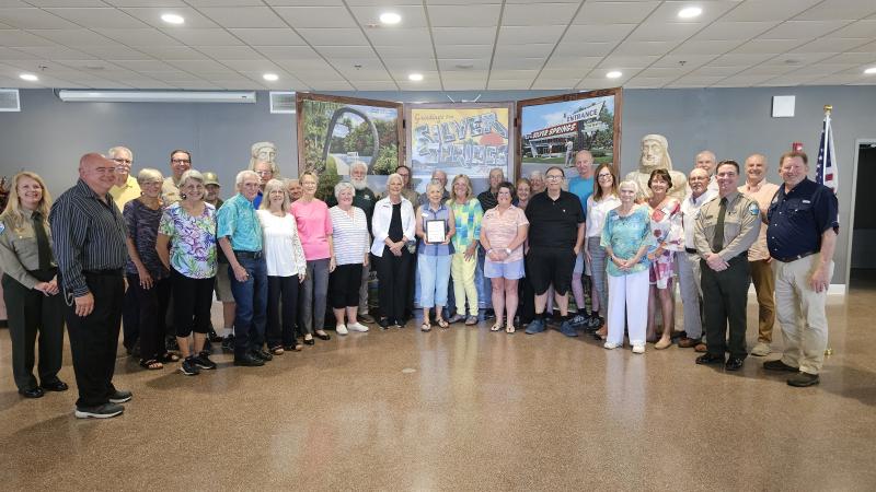 Volunteer receiving award.