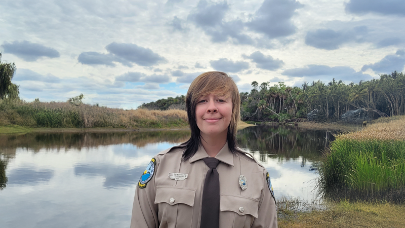 Natalie Lloyd in front of a lake.