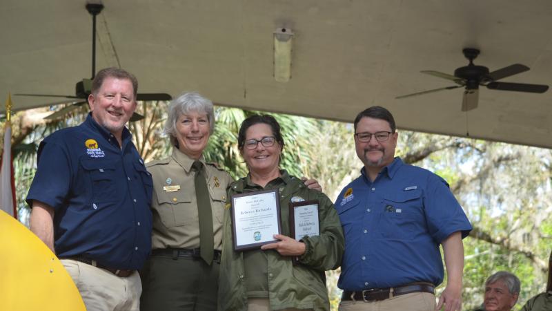 Volunteer receiving award.