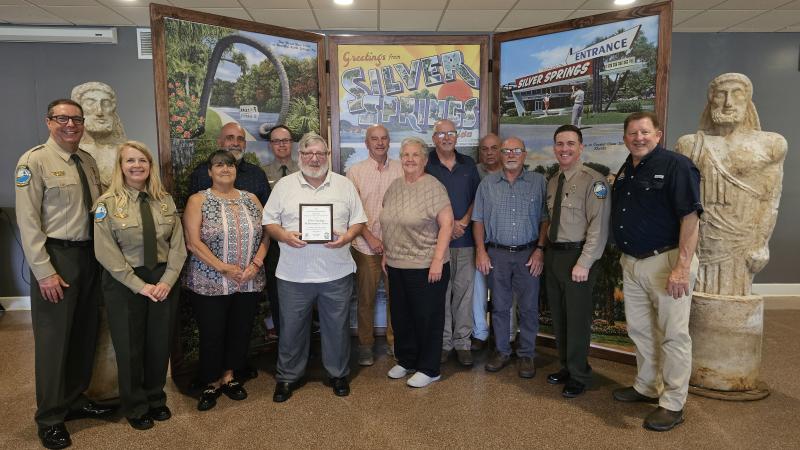 Volunteer receiving award.