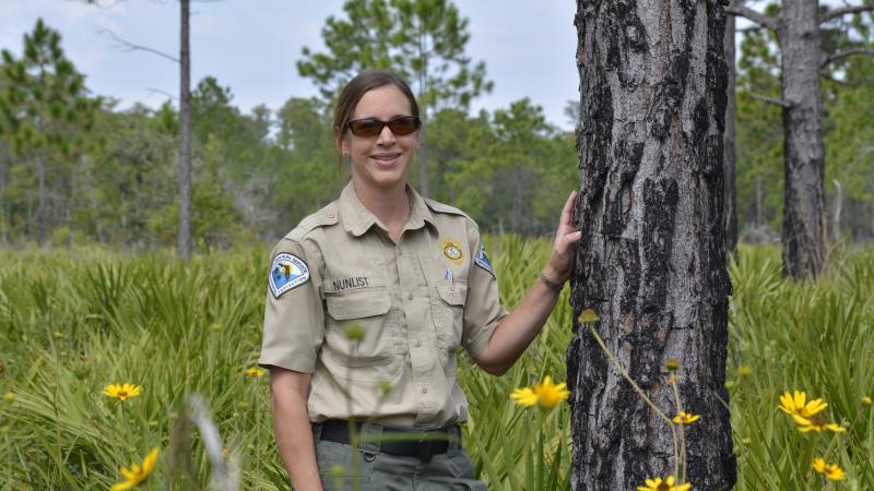 Rachel Nunlist, Lake Louisa Park Manager smiling at the camera