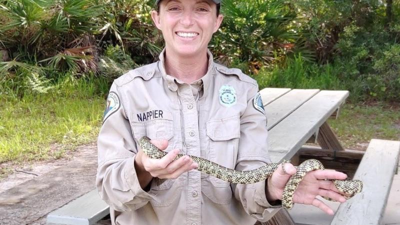 Van Fleet staff Amanda Nappier holding a snake