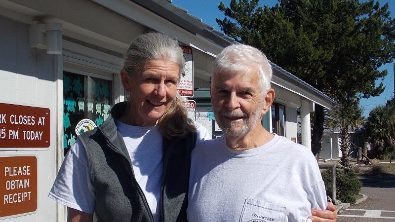 Image of Richard and Joan Becker standing outside a Talbot Island ranger station.