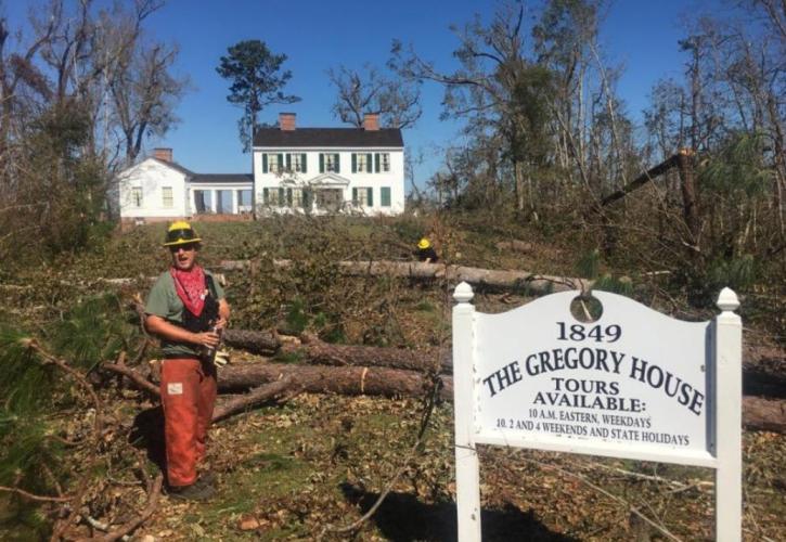 A view of the Gregory House during hurricane recovery efforts.