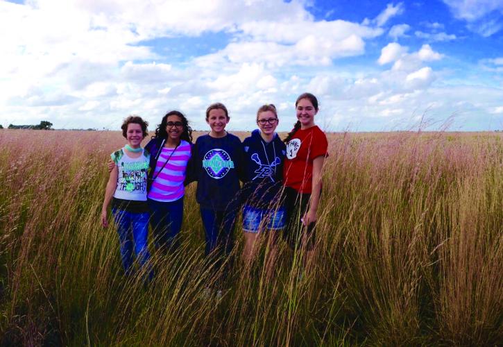 Kids standing in Prairie