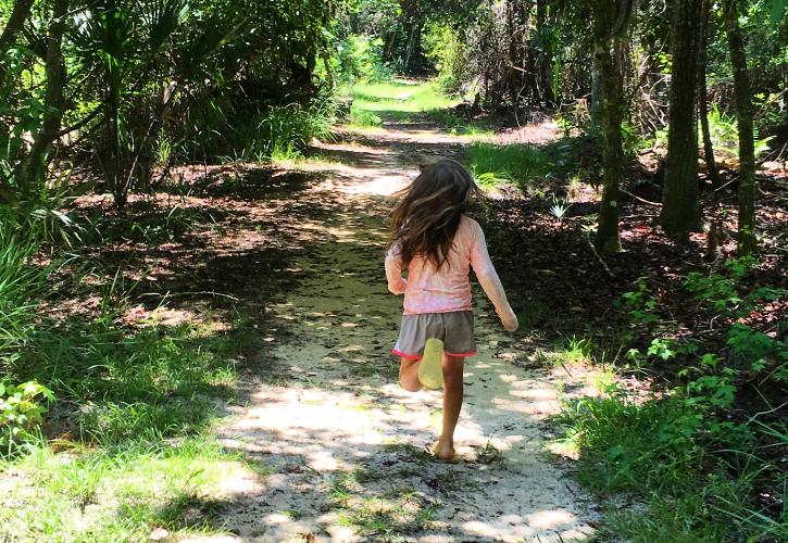 Child running on Trail