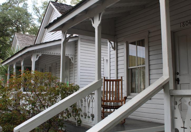 A rocking chair sits on the porch at one of the casistas at Ybor City Museum State Park.