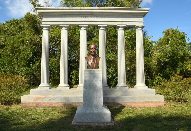 marble columns with bust of Barron Collier atop a marble pedestal