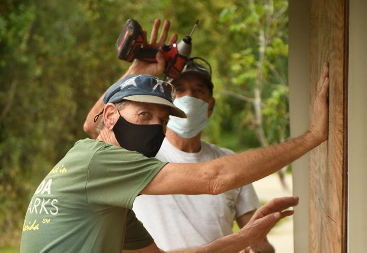 Two men working
