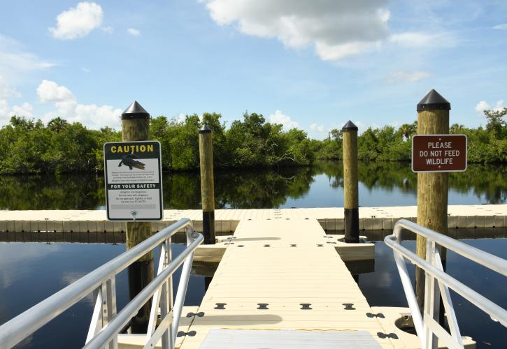 Floating boat dock with safety signage