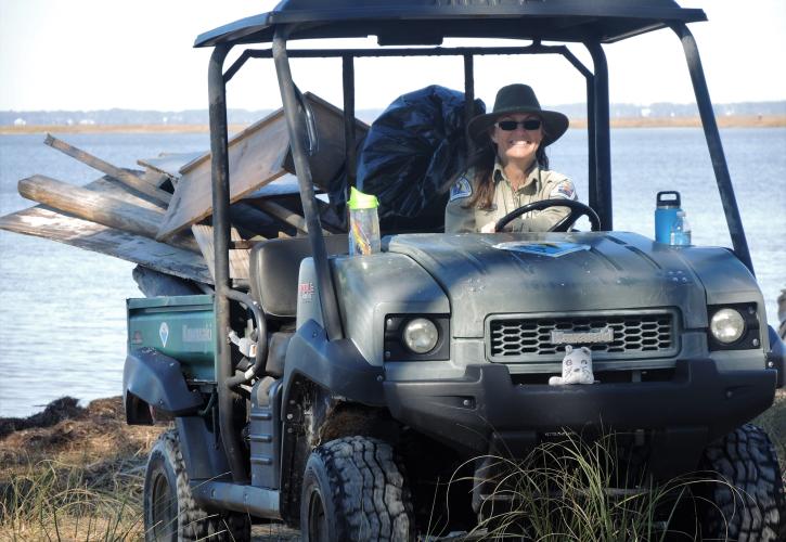 Park staff utilize UTV's to remove the piles of large debris gathered by volunteers. 