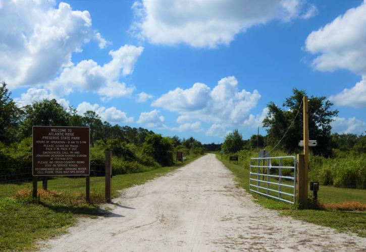 The park sign and gates welcome visitors to the park.