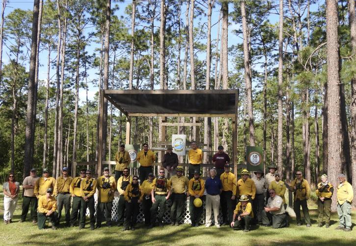 The crew gathers for a photo before the commemorative prescribed fire on May 17, 2021.