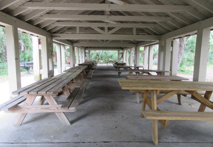 A view from inside the South Pavilion shows rafters and benches
