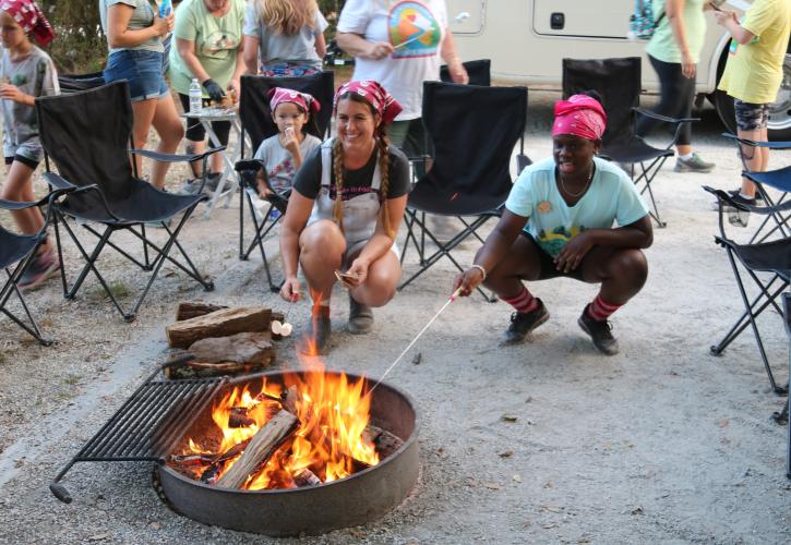 Roasting marshmallows while the fire is hot.