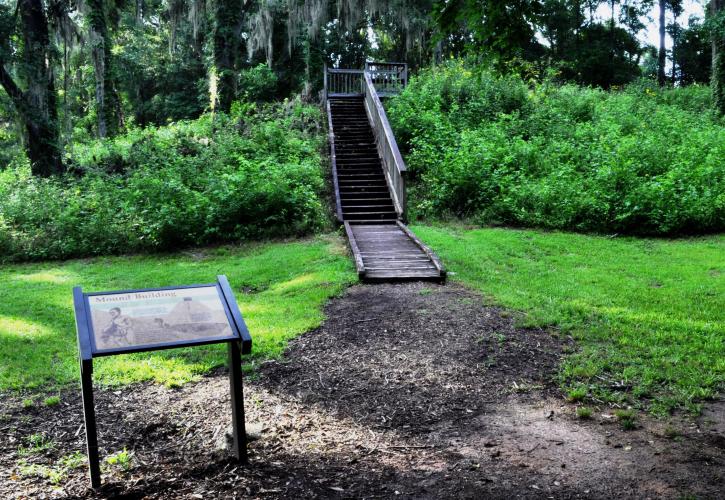 Interpretive panel next to boardwalk leading to mound overlook.