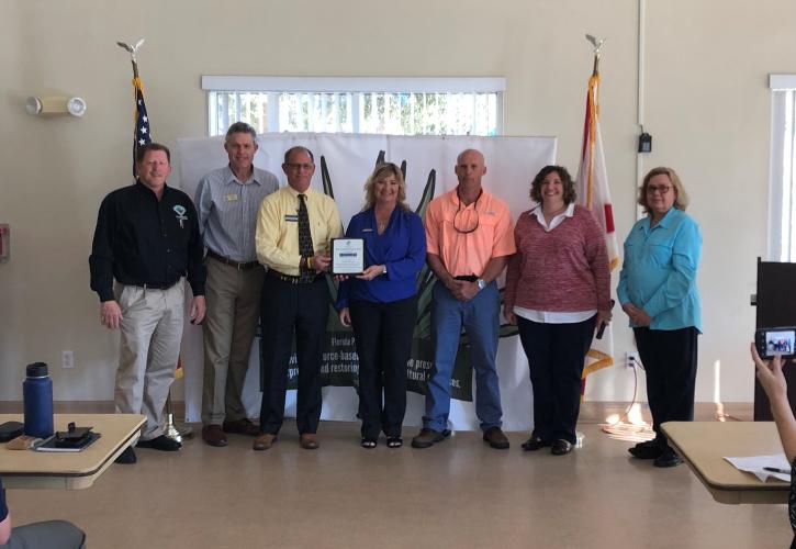 Representatives from Johnson Engineering, Inc. accepting their award.