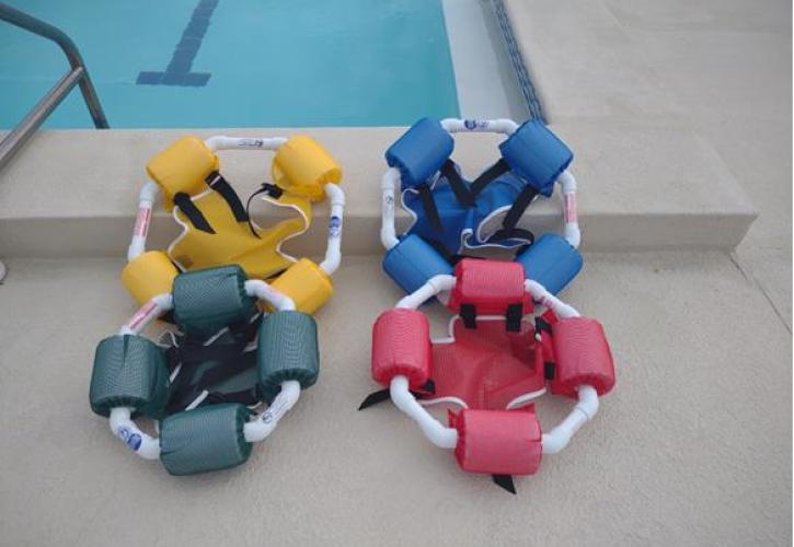 Aqua floats that you sit in, on the ground next to a pool.