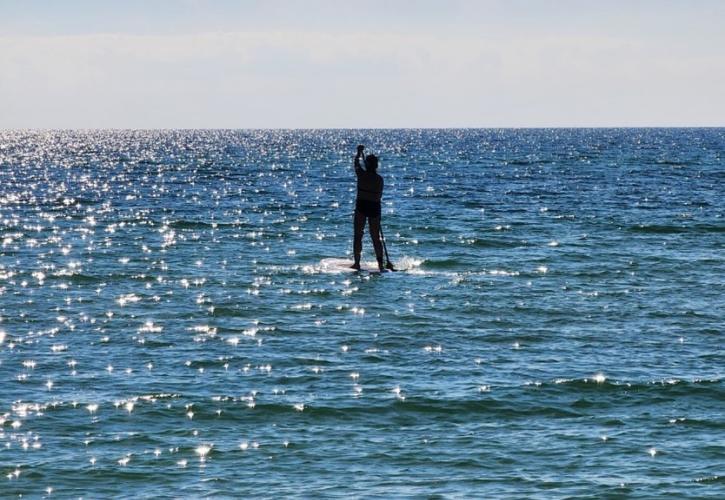 Paddleboarder on the water