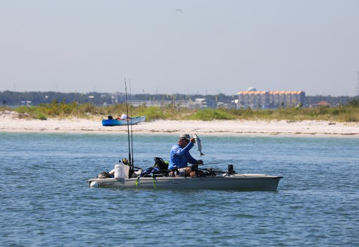 Fisherman in kayak